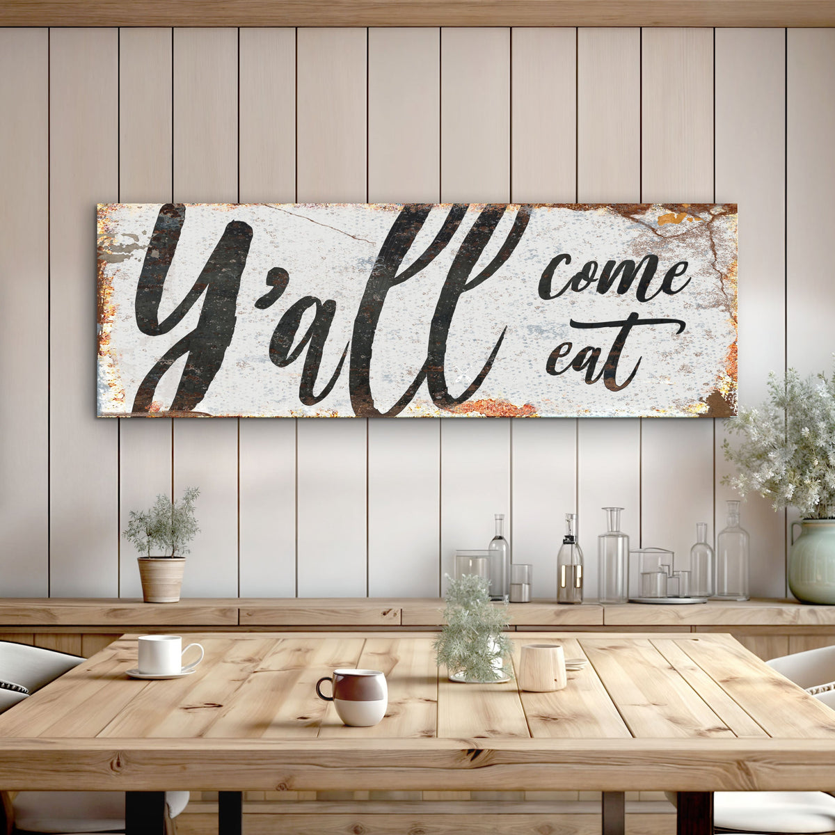 Landscape wall sign with distressed white panel and black “Y’all come eat” lettering